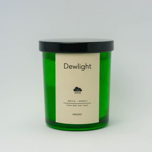MINZAY Dewlight scented candle jar in a home setting